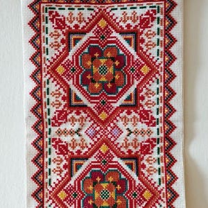 Palestinian Bedouin Red tatreez embroidered wall hanging on cream fabric