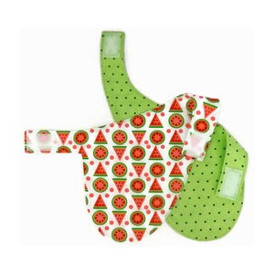 May include: A reversible dog bandana with a watermelon print on one side and green polka dots on the other side. The bandana has a velcro closure.