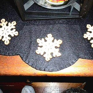 Primitive snowflake candle mat with coffee dye snowflakes(shown) or off white snowflakes on a black background. image 4