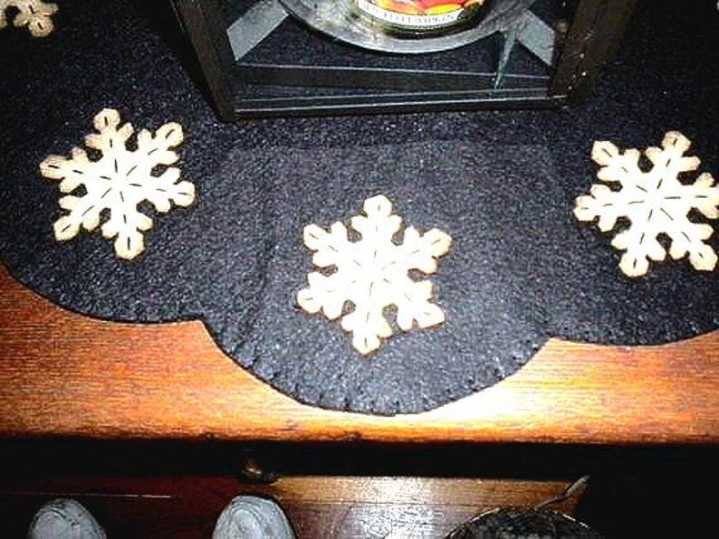 Primitive snowflake candle mat with coffee dye snowflakes(shown) or off white snowflakes on a black background. image 4