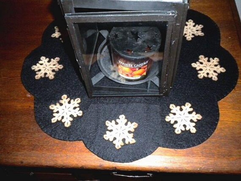 Primitive snowflake candle mat with coffee dye snowflakes(shown) or off white snowflakes on a black background. image 3