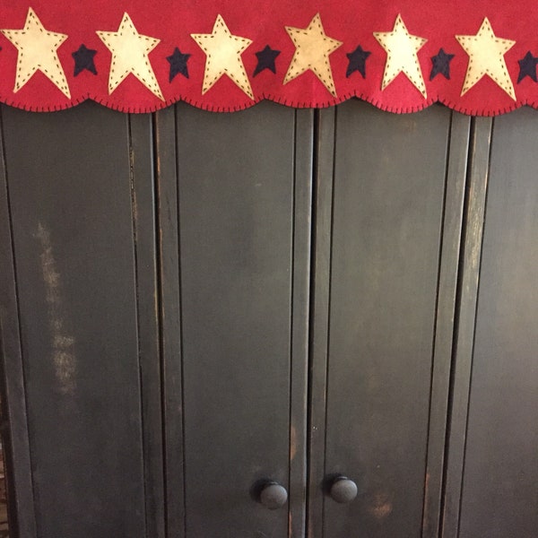 Shelf or mantle scarf red  background with coffee dyed white and navy stars measuring 14 x 36 inches.