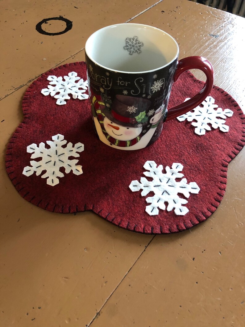 Snowflake Mat Pot Primitive Snowflake Candle Mat With a Dark Red Background and off White ...