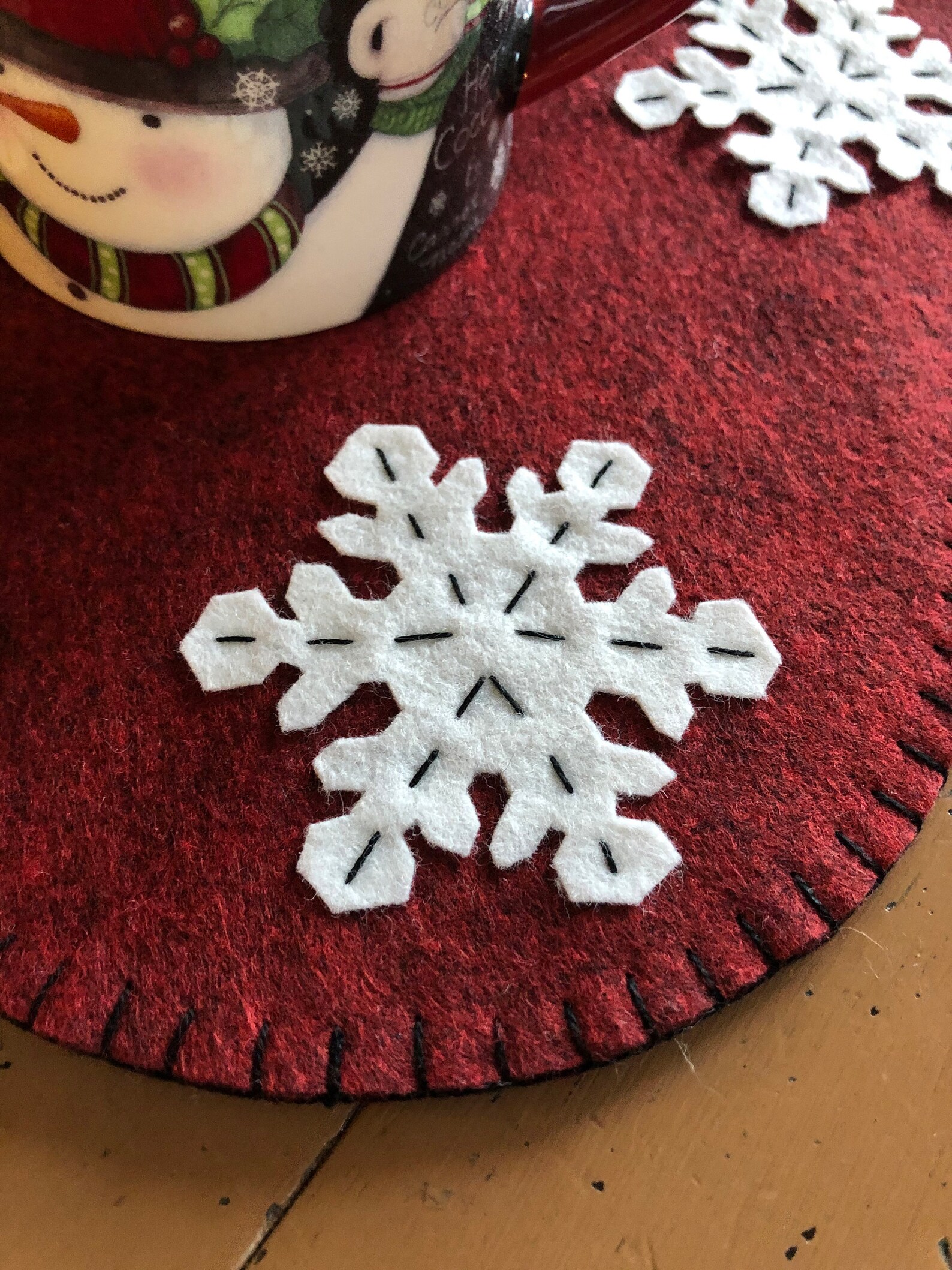 Snowflake Mat Pot Primitive Snowflake Candle Mat With a Dark Red Background and off White ...