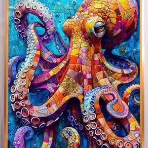 May include: A framed wall art print featuring a vibrant, multi-coloured octopus composed of geometric mosaic-style patterns in shades of orange, yellow, purple, and pink, set against a deep blue aquatic background with visible suction cups.