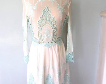 White Linen Dress: Dolce Vita with light green embroidery Details, Pockets, and Long Sleeves