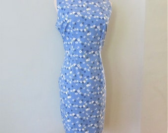 Cottage Core Blue 100% Cotton Sun  Dress with small white rose Print . Zips up the back.