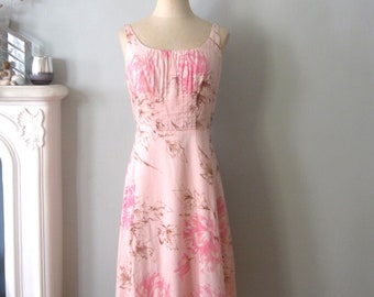 Ann Taylor Loft Pink sleeveless dress for summer . Fit and flare dress size 10 petites 100% cotton. 1950's style dress.