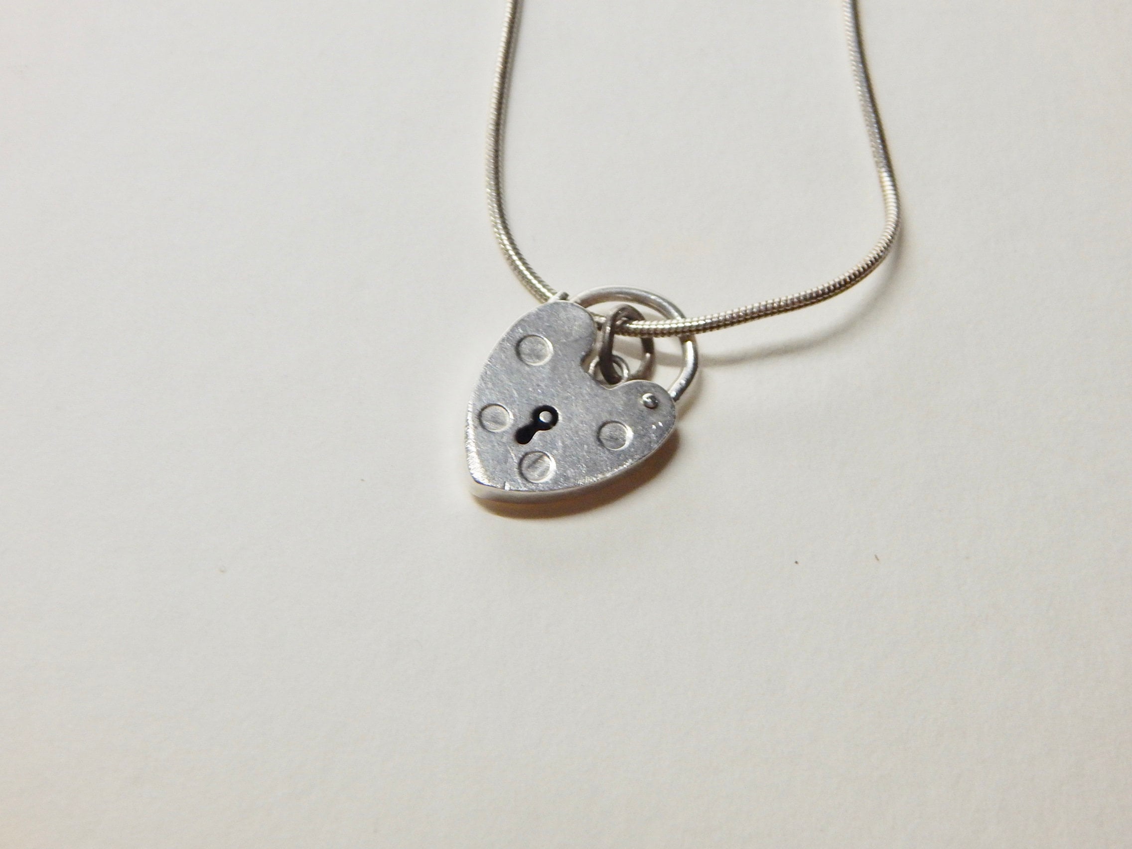 Sterling SIlver Lock Closure necklace. Unique. Does not