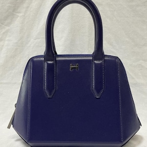 Bolso de mano estilo cartera de cuero morado Halston Heritage vintage de los años 2000