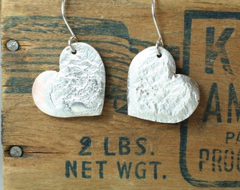Melted sterling silver on copper heart earrings