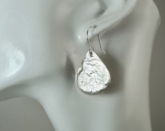 Tear drop sterling silver melted on copper dangle earrings
