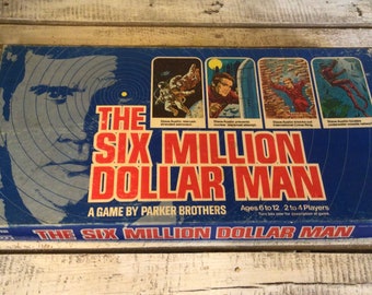 VINTAGE 1975 SIX MILLION DOLLAR MAN GAME PHOTO MAGNET~Thin Flexible 4 X 2.5 in. 