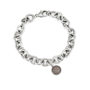 This photo shows the sterling silver cable chain cremation bracelet with the 8mm dome ashes charm. The chain on this bracelet in thick and is a statement piece.
