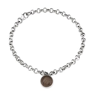 May include: A silver chain bracelet with a round, brown charm. The charm has a swirl design.