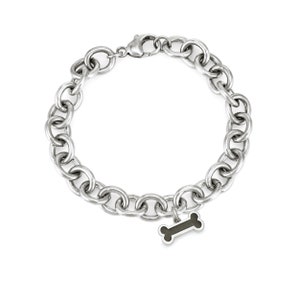 This photo shows the sterling silver cable chain cremation bracelet with the dog bone ashes charm. The chain on this bracelet in thick and is a statement piece.