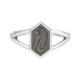 May include: A silver ring with a hexagonal gray stone set in the center. The stone has a swirling pattern.