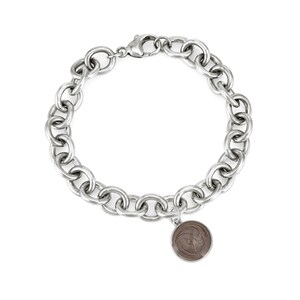 This photo shows the sterling silver cable chain cremation bracelet with the 10mm dome ashes charm. The chain on this bracelet in thick and is a statement piece.