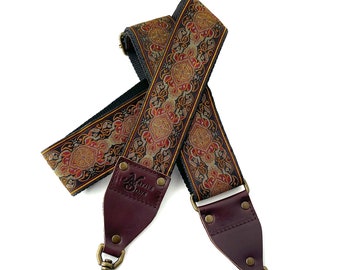 The Jupiter Guitar Strap Style Bag Strap - Vintage Style Gold and Burgundy tapestry design on Black with Custom Leather in Browns and Black