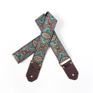 The Avalon Guitar Strap by Native Sons - unique tapestry teal blue, red, gold &  black guitar strap made of hemp / nylon  custom Leather