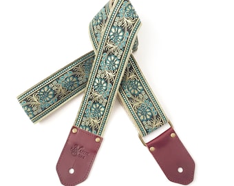 The Luna Guitar Strap - Gold and Teal Blue with incredible vining floral on black background with leather, on hemp or Nylon