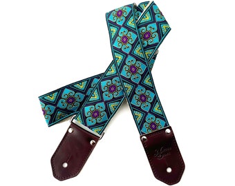 The Pandora Guitar Strap -Teal Blue Purple with yellow highlights on black background with leather, on hemp or Nylon w diamond heart details