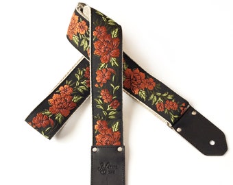 The Copper Penny Guitar Strap - Adjustable guitar strap with floral copper design on  black background with leather ends - Orange flower