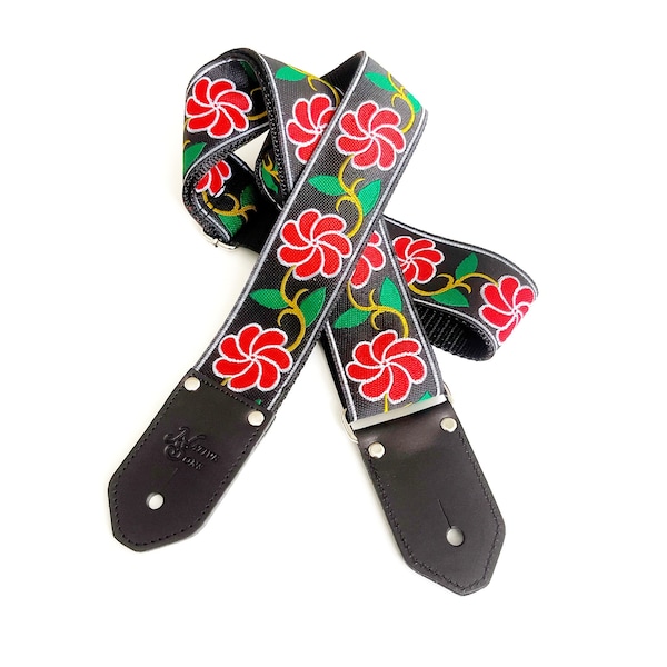 The Ella Guitar Strap de Native Sons - Flor de molinete rojo brillante con correa de guitarra verde y amarilla y negra de cáñamo o nylon de 2 pulgadas de ancho