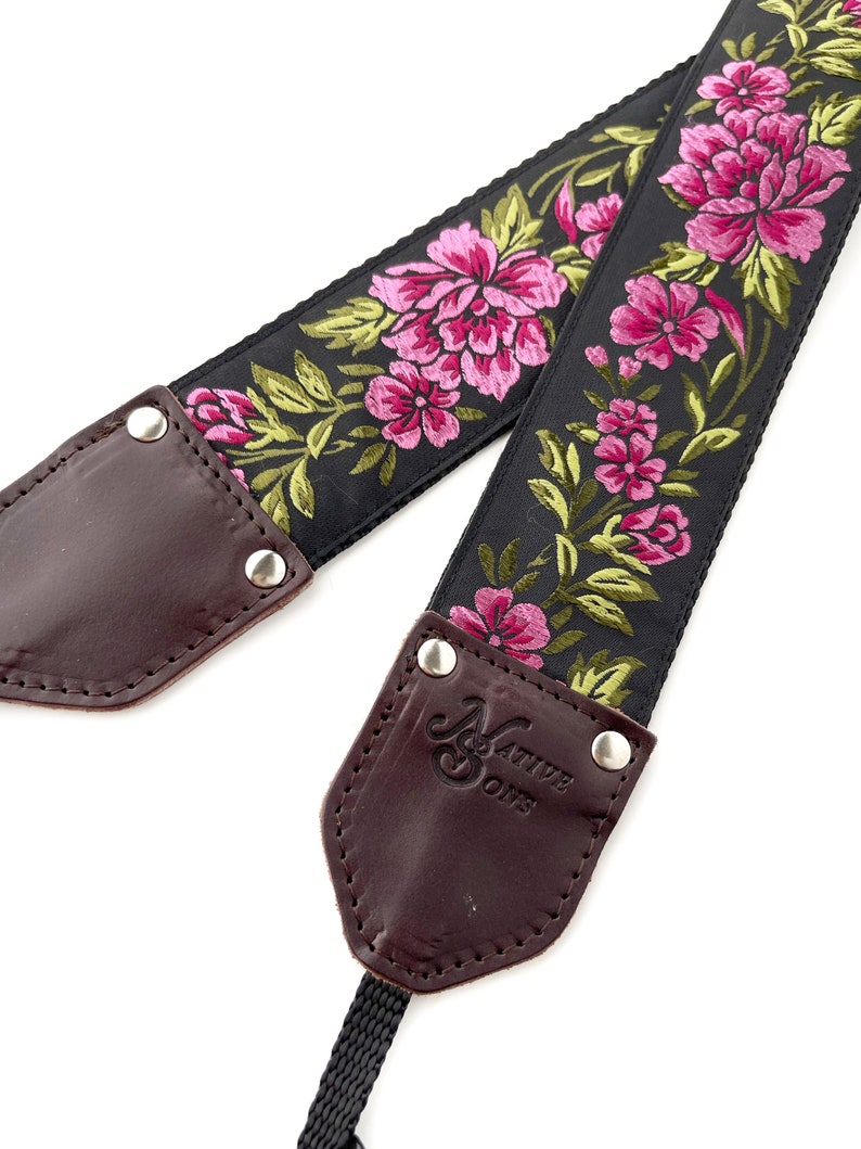 The Odel Camera Strap Fuchsia Pink and green floral on a black background, & leather image 2