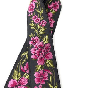 The Odel Camera Strap Fuchsia Pink and green floral on a black background, & leather image 4