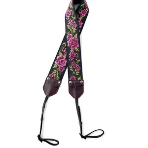 The Odel Camera Strap Fuchsia Pink and green floral on a black background, & leather image 5