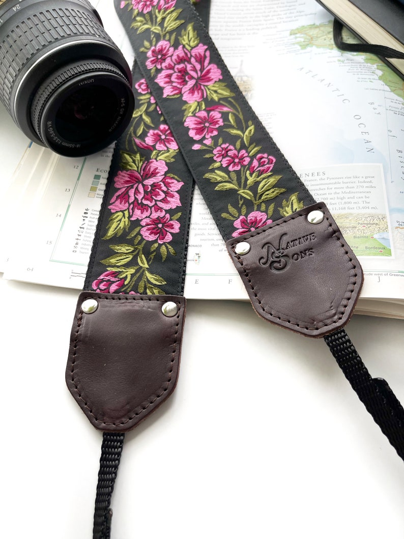 The Odel Camera Strap Fuchsia Pink and green floral on a black background, & leather image 3