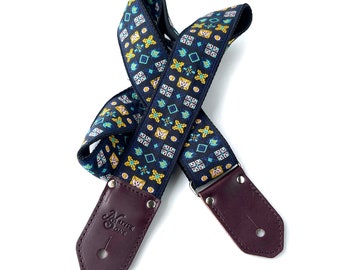 The Pixel Guitar Strap - by Native Sons Navy and aqua blue with yellow and pink designs