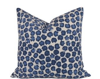 May include: A blue and white patterned cushion with a blue and white abstract design. The cushion is made of a soft, comfortable fabric and is perfect for adding a touch of style to any room.