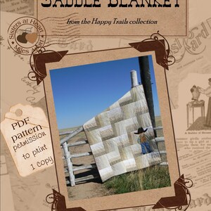 May include: A PDF pattern for a saddle blanket quilt with a cowboy applique. The quilt is hanging on a wooden fence in a field with a blue sky and white clouds. The pattern includes permission to print one copy. The text "Saddle Blanket from the Happy Trails collection" is at the top of the image.