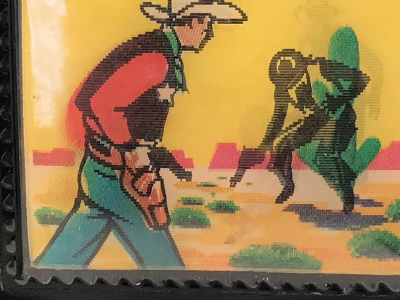 May include: A vintage illustration of two cowboys in a desert landscape. One cowboy is wearing a red shirt, blue jeans, and a brown hat. The other cowboy is wearing a green shirt and blue jeans. The cowboys are standing in front of a cactus.