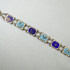 Pulsera de eslabones NÁUTICOS DE LEY - Plata 925 vintage - Esmalte azul y blanco - Sello Birmingham T&S - Poseidón, ancla, caballito de mar, gaviota, brújula y marsopa