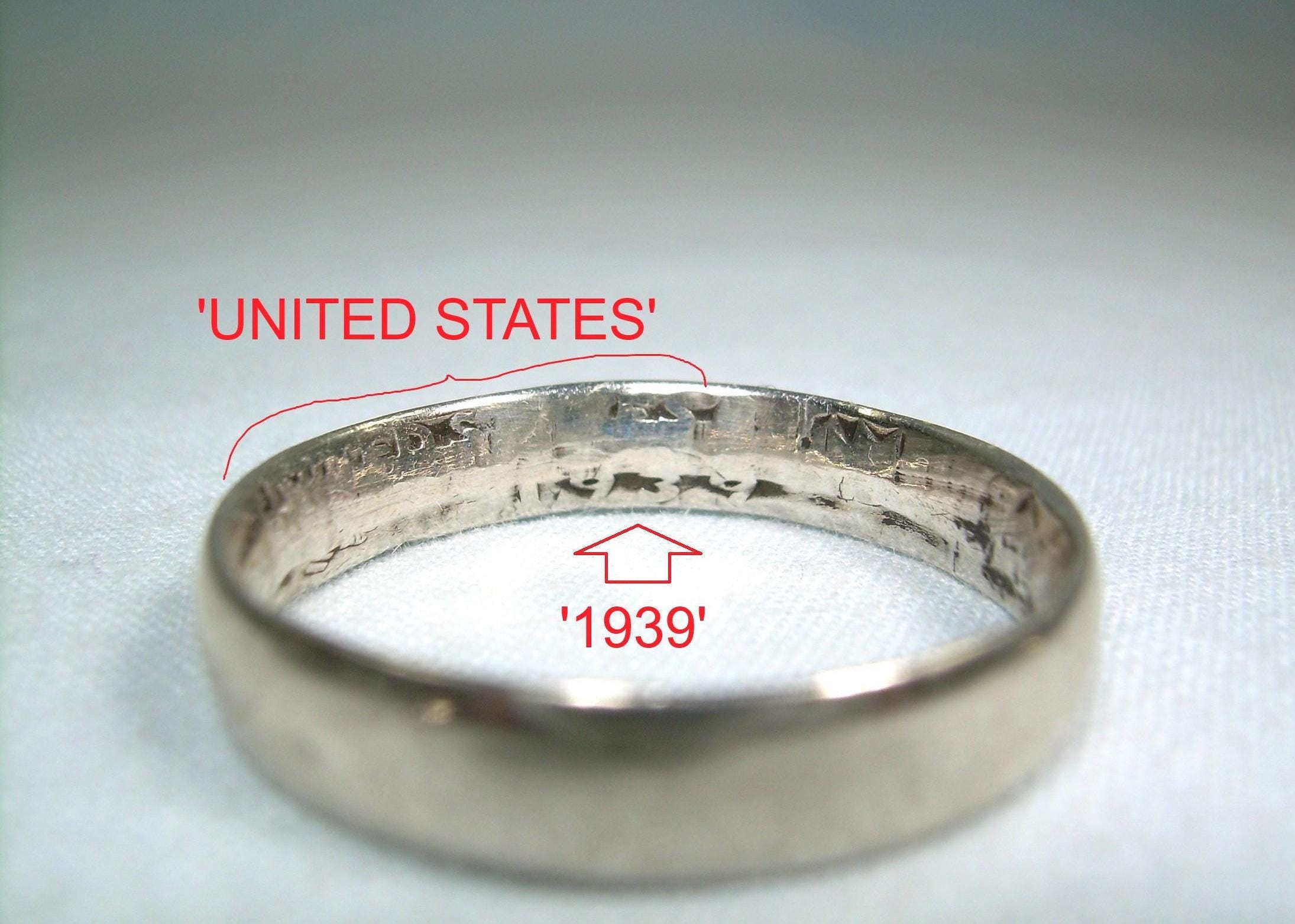 Anello con moneta da un quarto di dollaro degli Stati Uniti del