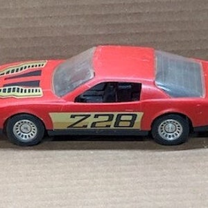vintage 1980s chevy camaro Z28, vintage chevy, chevy camaro, vintage toy car, red camaro, vintage car, Z28 camaro, 1980s toys vintage, car