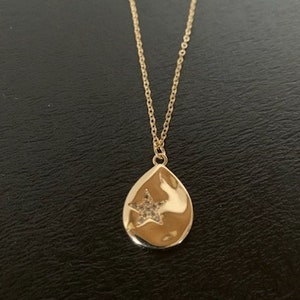 rhinestone star necklace, star necklace, star necklace gold, gold star necklace, rhinestone star, wavy gold necklace, wavy necklace, star