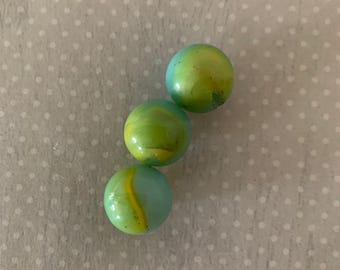 3 vintage opaque light blue marbles w/green yellow swirls, light blue marbles, vintage marbles, opaque marbles, swirl marbles, blue marbles