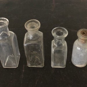 4 small vintage glass bottles, apothecary bottles, vintage apothecary, vintage bottles, old medicine bottles, bottles vintage, old bottles