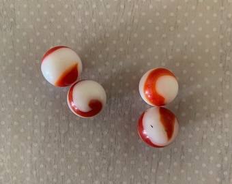 4 translucent base with white and red corkscrew vintage marbles, vintage marbles, antique marbles, old marbles, marbles vintage, red marbles