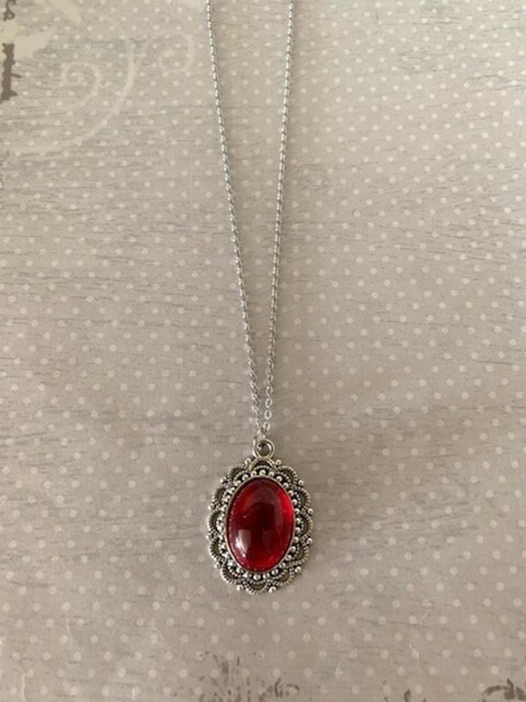 Red stone pendant best sale necklace