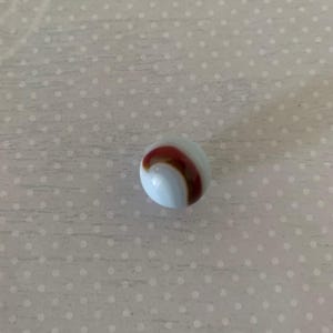 1 translucent white marble w/oxblood ribbon, oxblood marble, antique marbles, vintage marbles, uv marbles, glass marble, collector marble