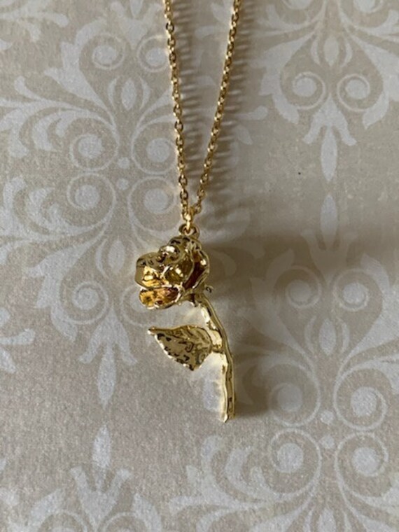 Hanging rose necklace best sale