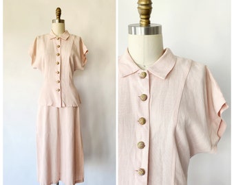 vintage 1940s pink linen two piece suit jacket with peplum and skirt set