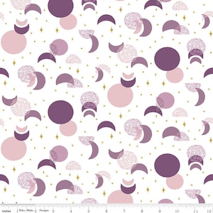 May include: A white fabric with a repeating pattern of purple and pink moons, stars, and floral designs. The pattern is on a white background.