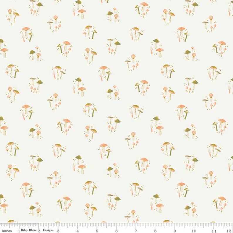 May include: A white fabric with a repeating pattern of pink and brown mushrooms. The mushrooms are of various sizes and shapes, and some have white spots.