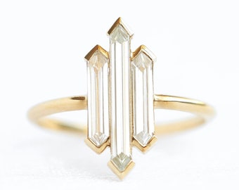 Unique three diamond ring with hexagon diamonds
